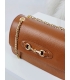 Kožená hnedá crossbody kabelka s retiazkou a zlatou ozdobou Edita
